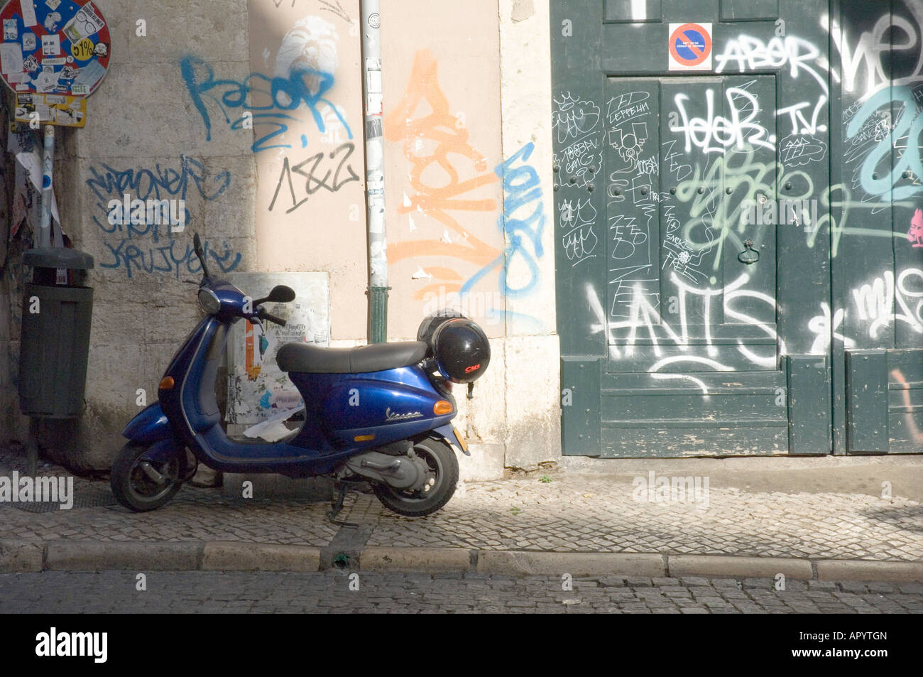 a vespa scooter in lisbon portugal Stock Photo