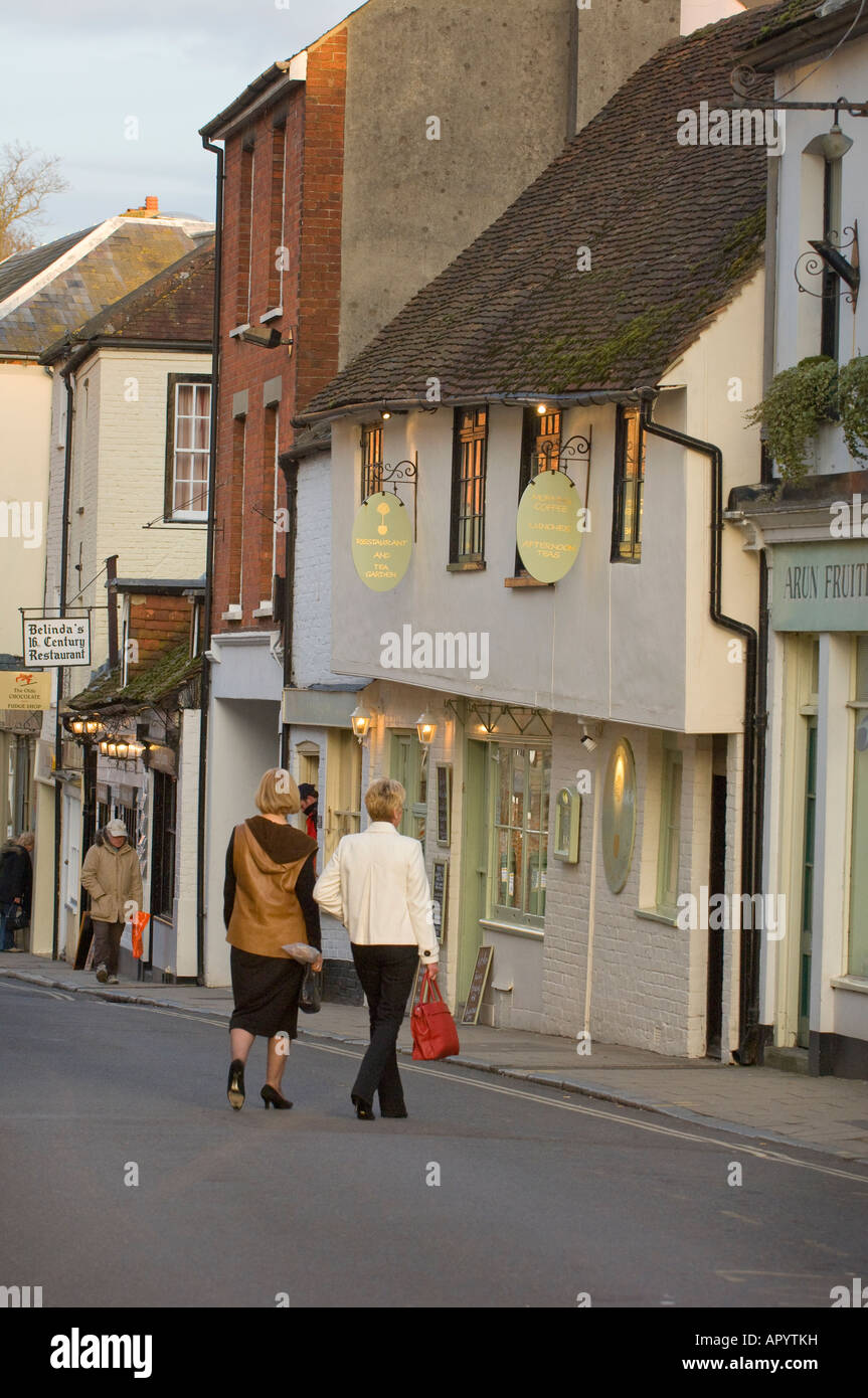 Two shoppers walking amongst the popular shops and cafes of Arundel in West Sussex, UK. Picture by Jim Holden. Stock Photo