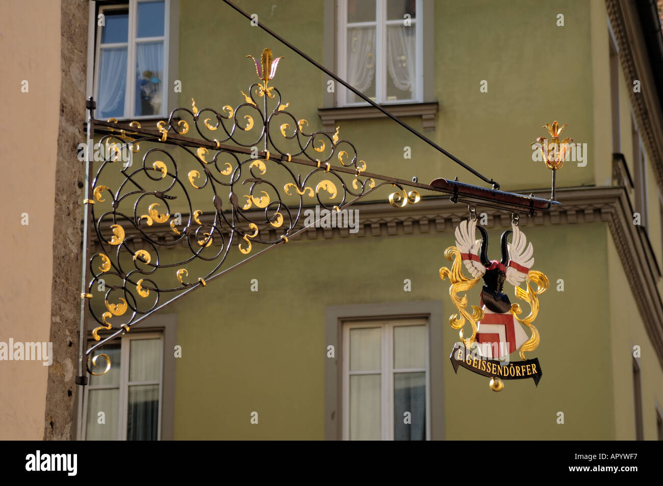 Ornate wrought iron shop signs, Rothenburg ob der Tauber, Bavaria (Bayern), Germany Stock Photo