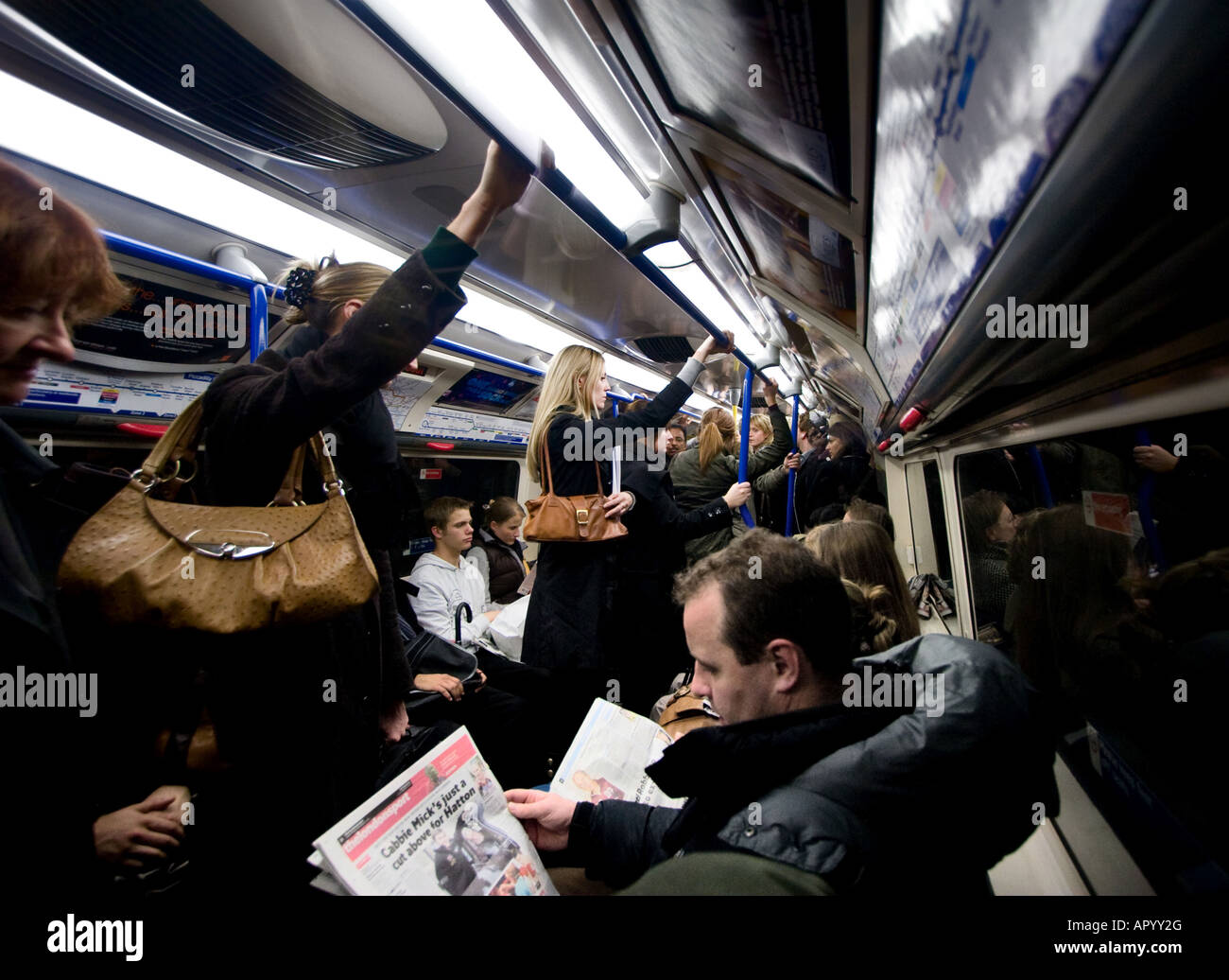 Tube riders packed into a tube train in the London Underground London