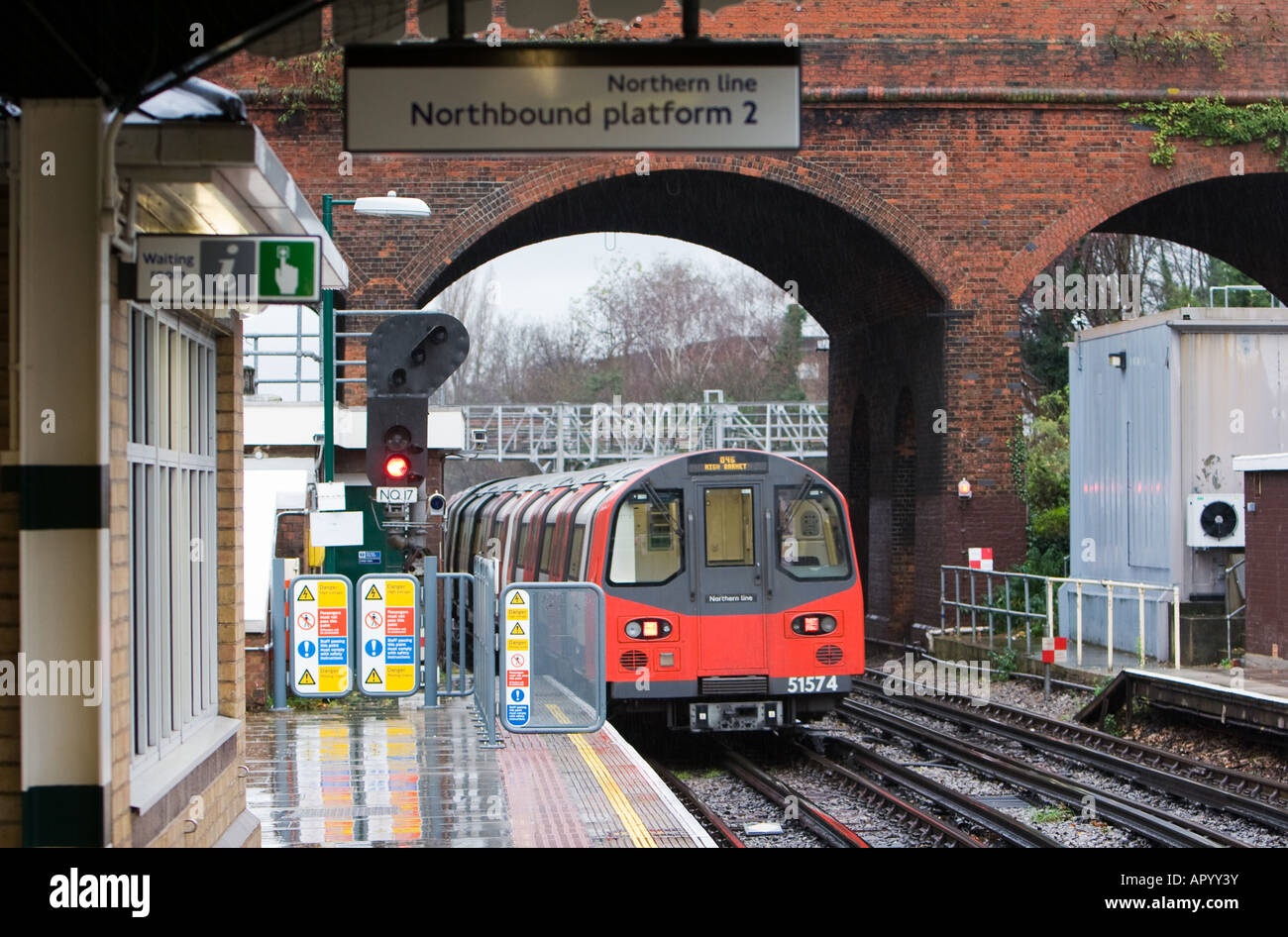 Northern Line train to High Barnet stops at Northbound platform 2 of Finchley Central in London UK December 6 2007 Stock Photo