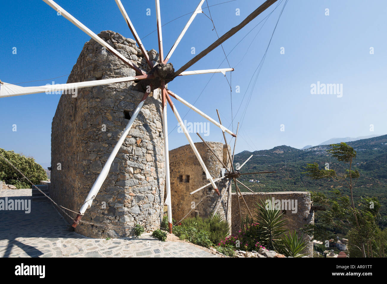 Windmills on the road between Heraklion and Agios Nikolaos, Lasithi Province, North East Coast, Crete, Greece Stock Photo