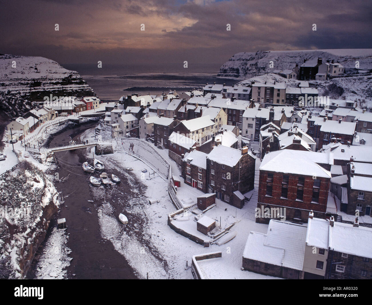 Staithes North Yorkshire Fishing Village with rare winter snow England Stock Photo