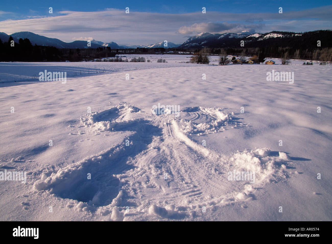 Snow angel shape in snow Cascade Mountains near Easton Washington USA Stock Photo