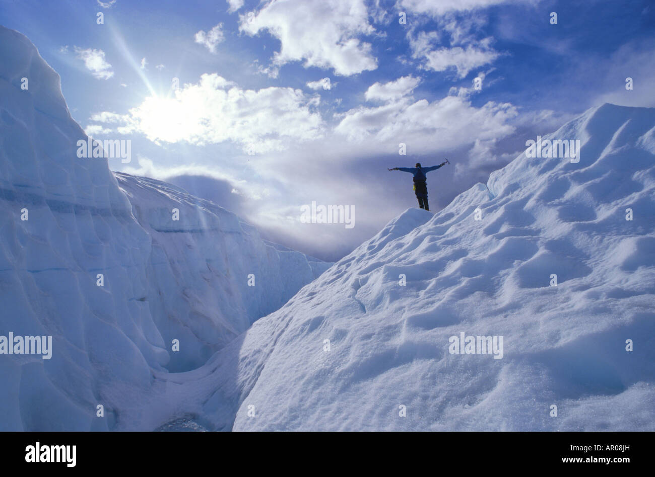 Ice Climber Victorious Matanuska Galcier SC Alaska Chugach Mts Spring Stock Photo