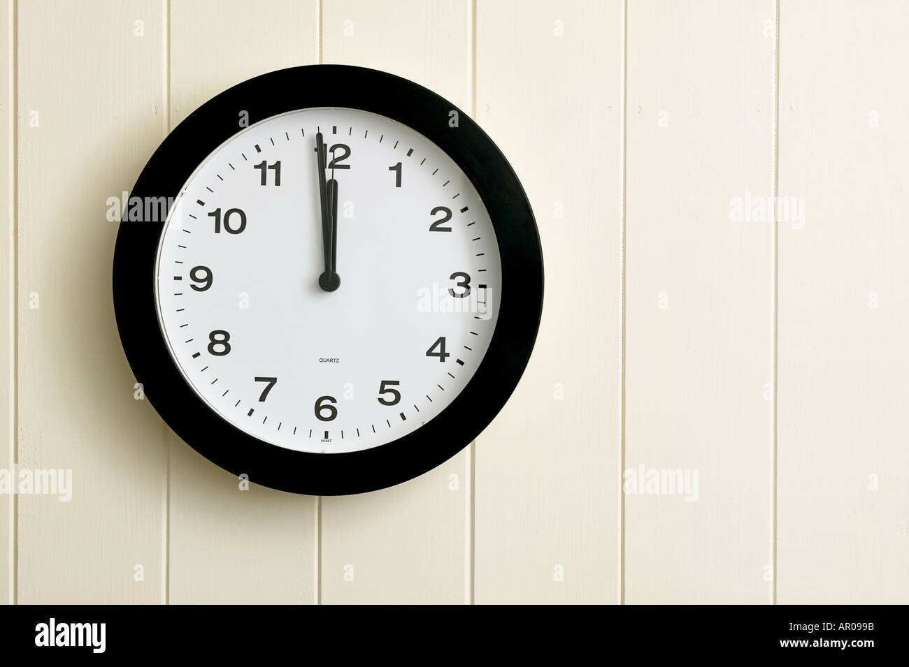 wall-clock-showing-time-at-a-minute-to-twelve-1159-2359-stock-photo-alamy