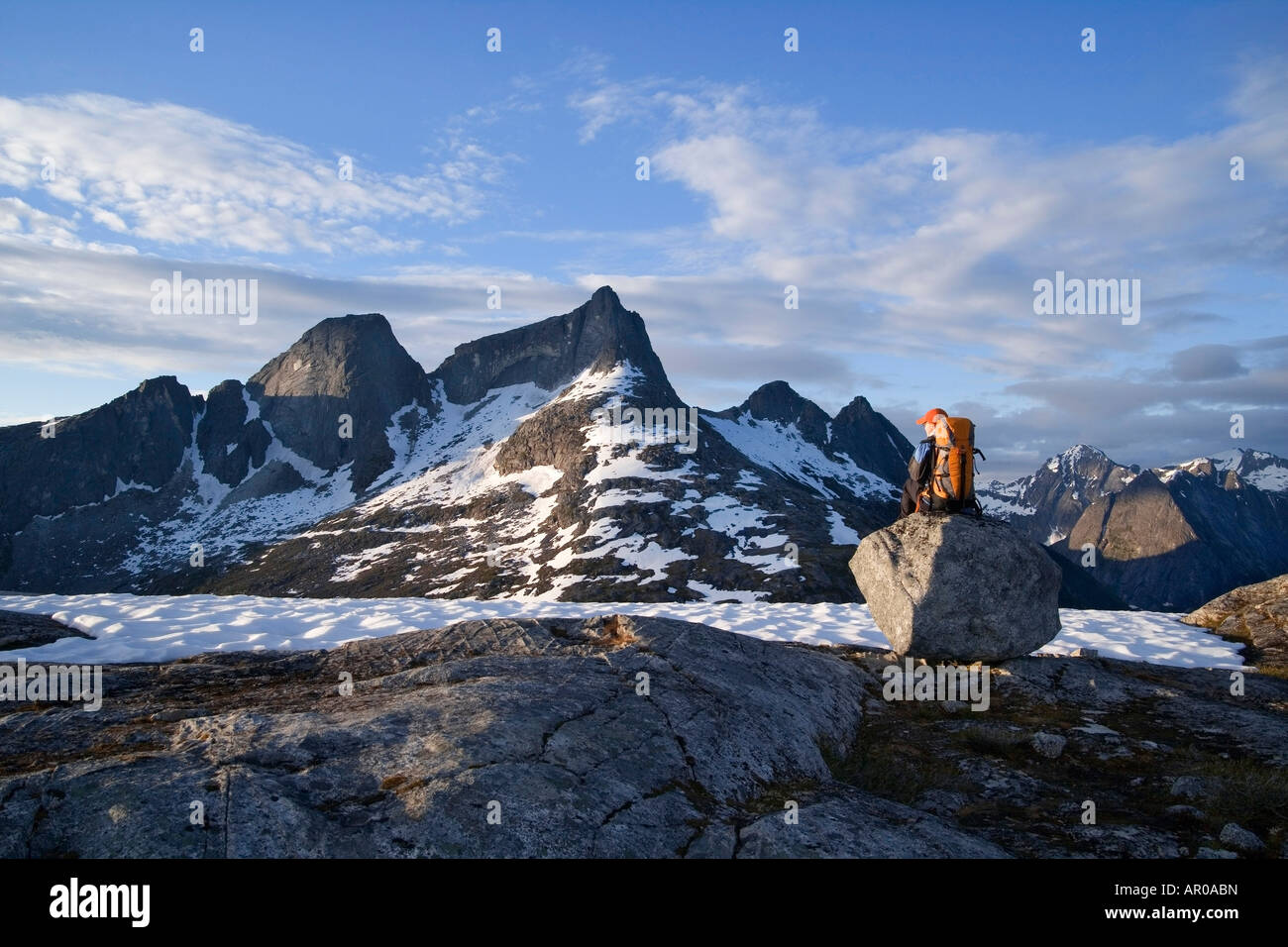 Female Hiker standing on rock overlooking Lynn Canal & Berner's Bay