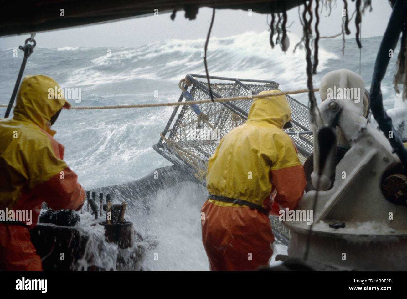 Fisherman Working on Deck in 50 Knot Winds Bering Sea AK /nOpilio Crab