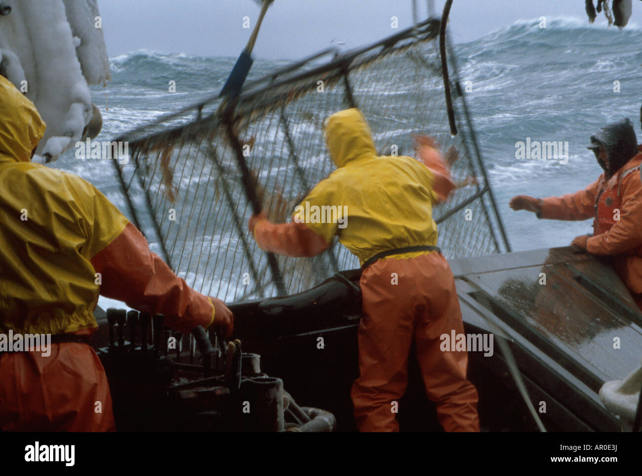 Fisherman Working on Deck High Winds Bering Sea SW AK /nOpilio Crab