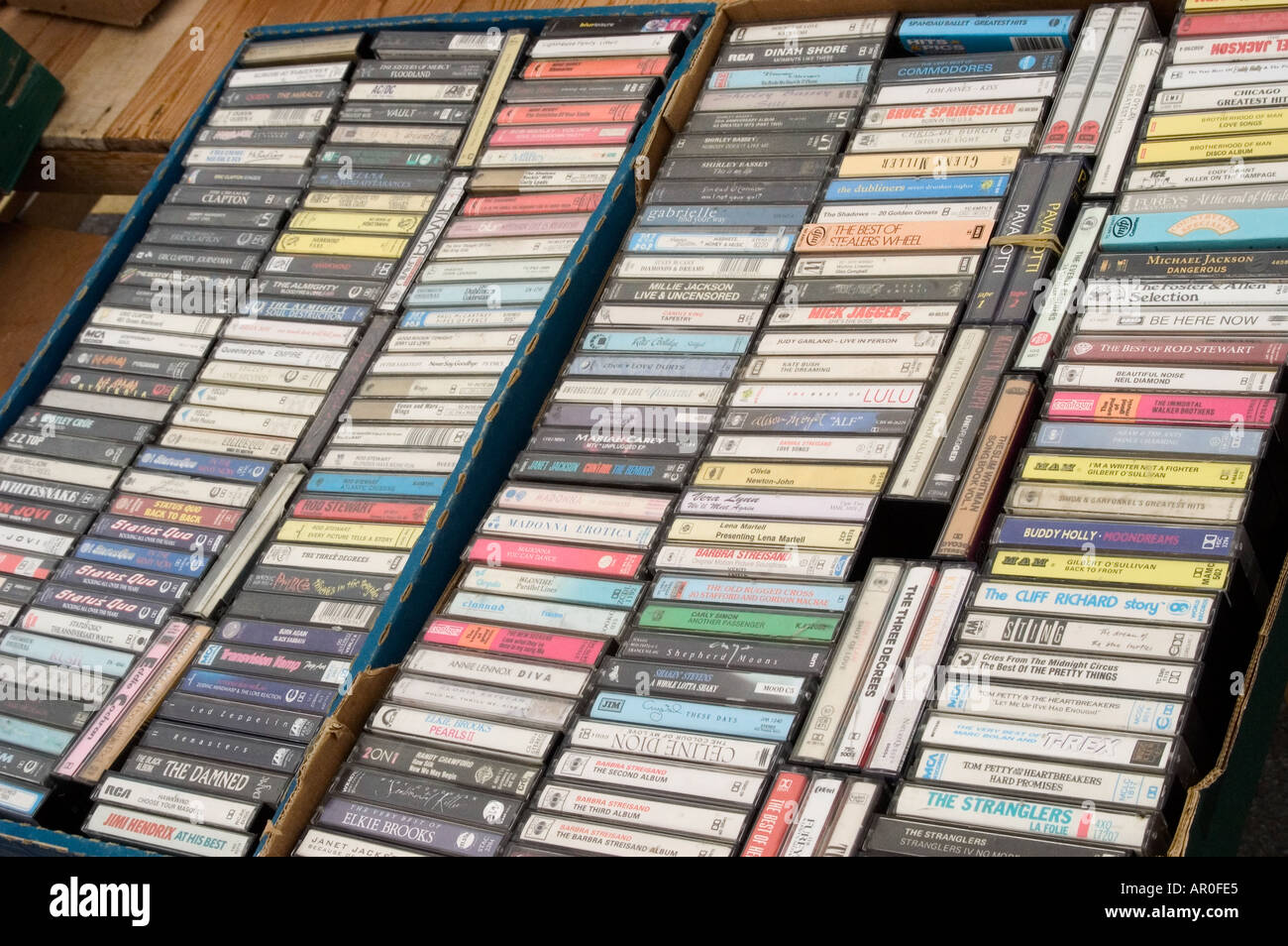 Audio cassette tapes on display for sale at a table top sale Stock Photo -  Alamy