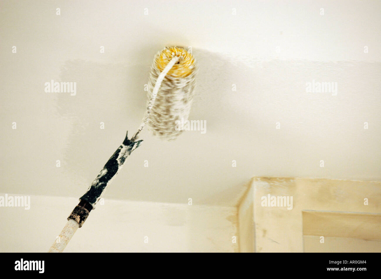 Painting the ceiling white Stock Photo Alamy