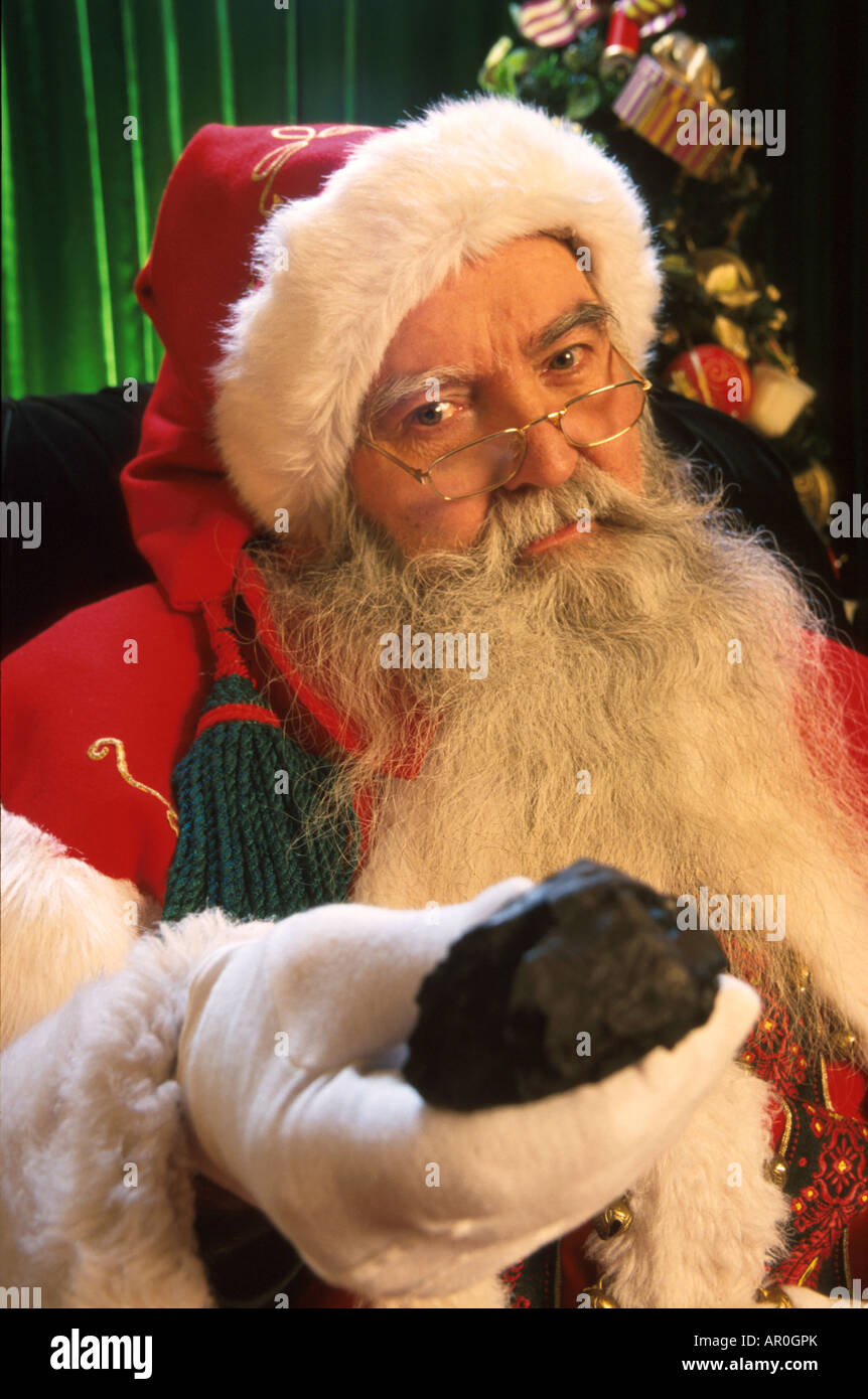 Santa Claus Holding a piece of Coal Portrait /nw/&w/o candy canes Stock