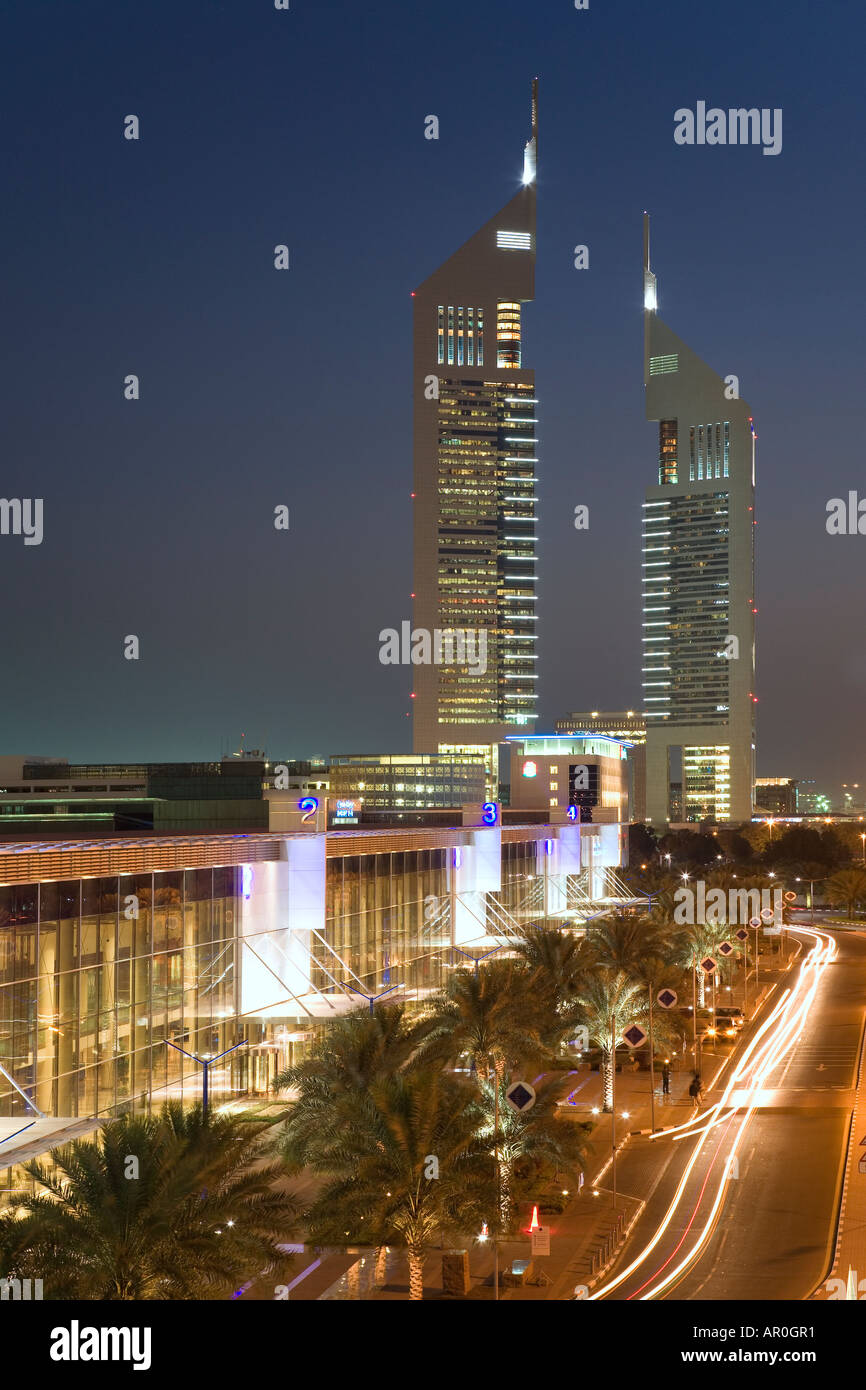 Dubai Skyline along Sheik Zayed Rd with Emirates Towers Dubai UAE Stock Photo