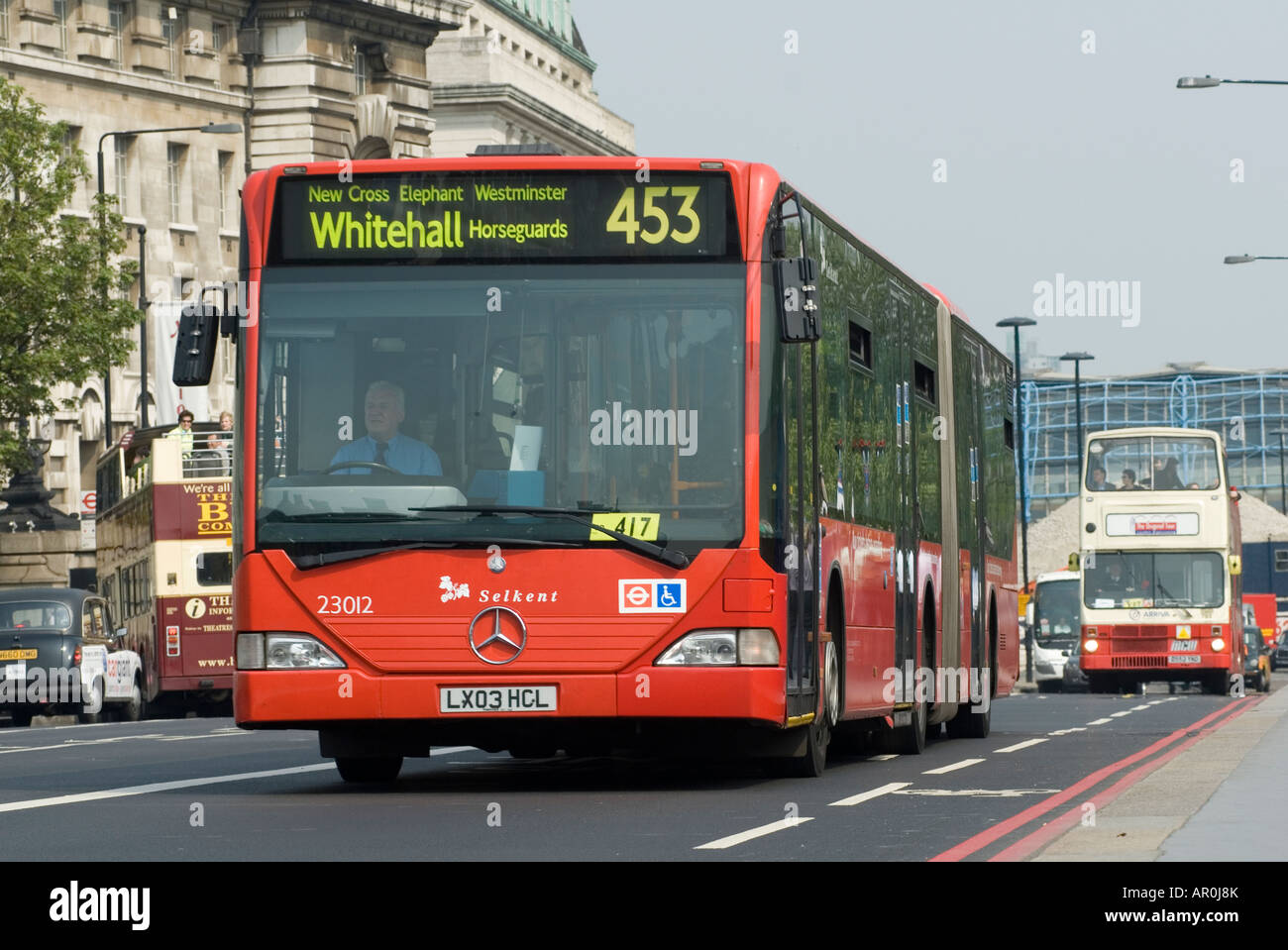 Red Bendy bus in London England Stock Photo