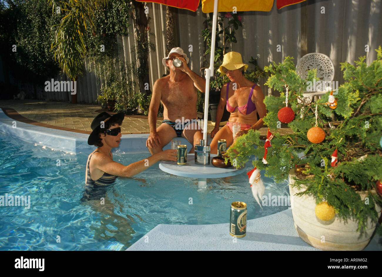 Australian Christmas, family in pool, Australien, Hot summer Christmas in southern hemisphere, family in pool at home, Weihnacht Stock Photo