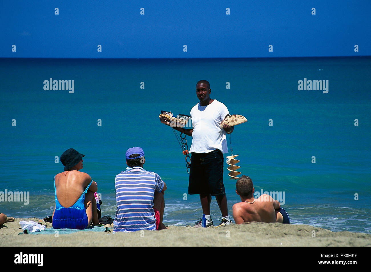 Souvenirverkaeufer und Touristen, am Strand, Turtle Beach bei Black Rock, Tobago, West Indies, Karibik Stock Photo