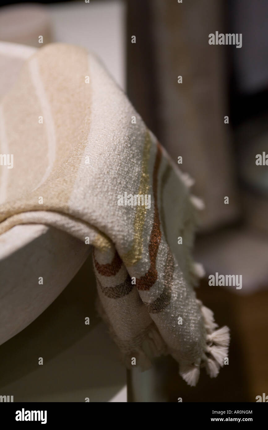 Natural linen fabrik towel for hamman and marble basin Stock Photo