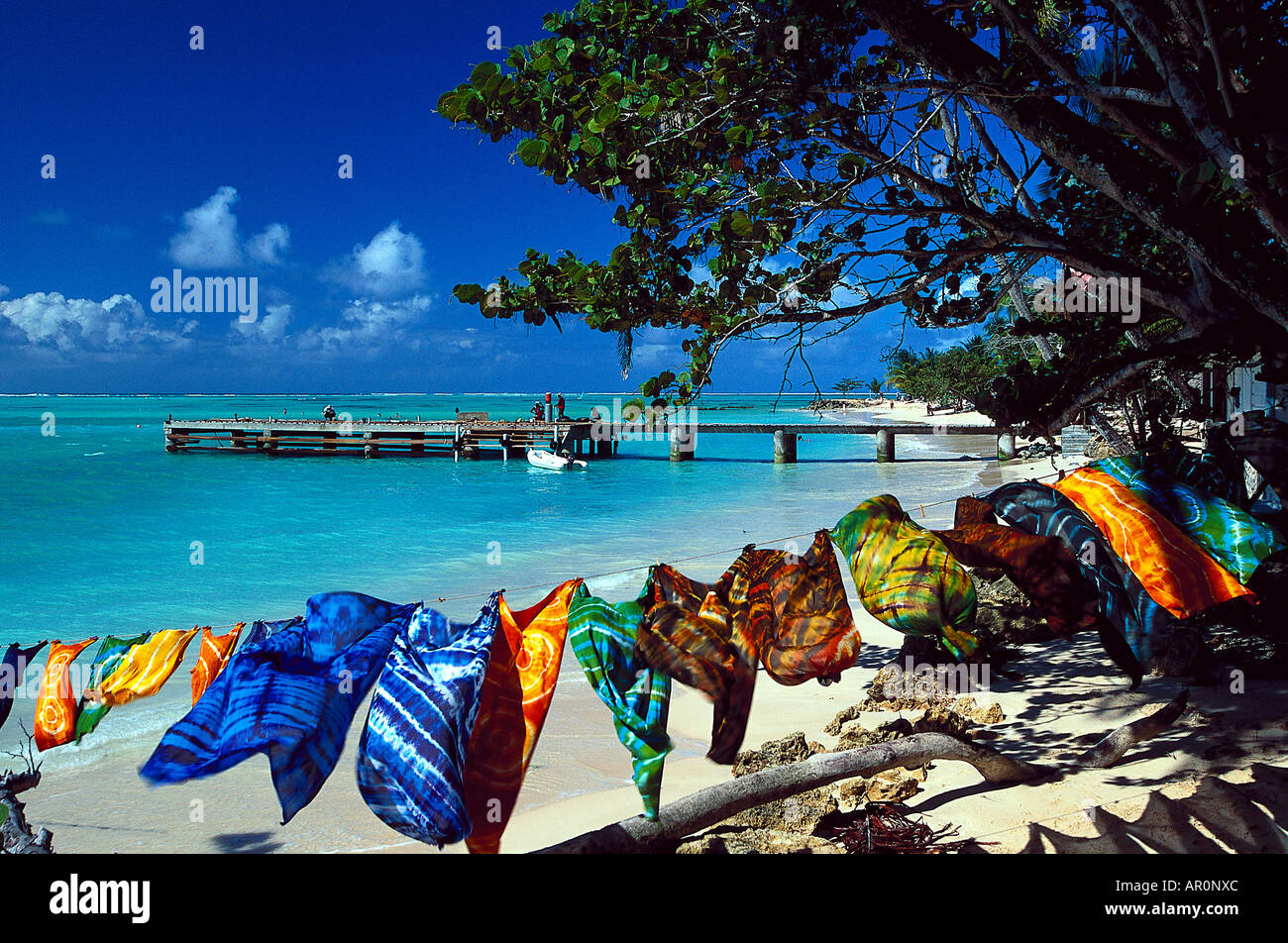 Sandstrand, Bunte Tuecher, Sarongs, Pigeon Point Tobago, West Indies, Karibik Stock Photo