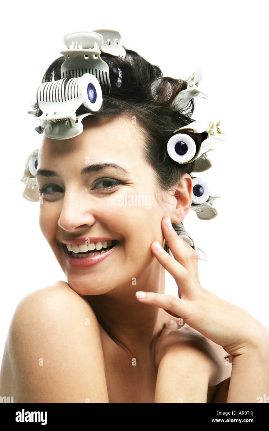 Woman wearing hair rollers Stock Photo Alamy