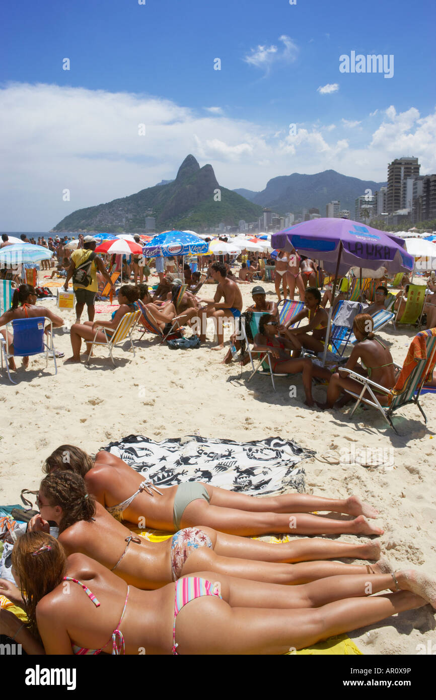 3 Girls Sunbathing On Ipanema Beach In Rio De Janeiro Brazil Stock Photo Alamy