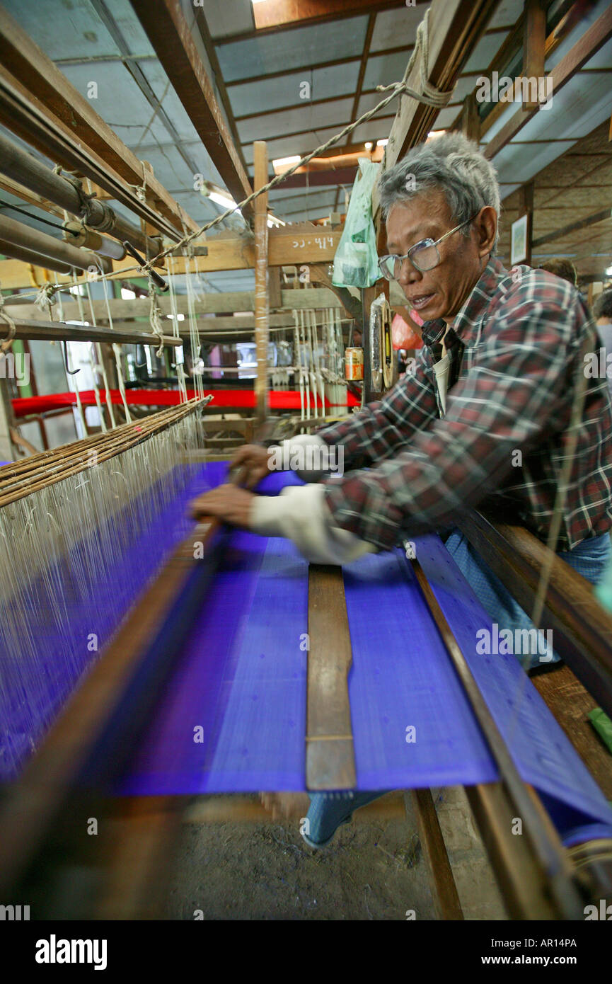 Weaver on loom, craftsman, Weberei, Handarbeit, Mann arbeitet am Webstuhl, Weber Stock Photo