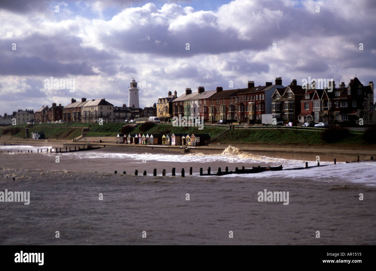 Southwold seafront beach waves and houses Suffolk England Stock Photo