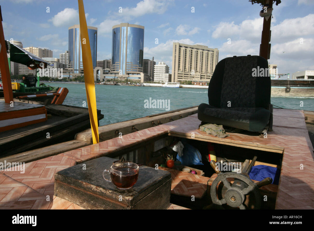 Man sitting on boat dubai hi-res stock photography and images - Alamy