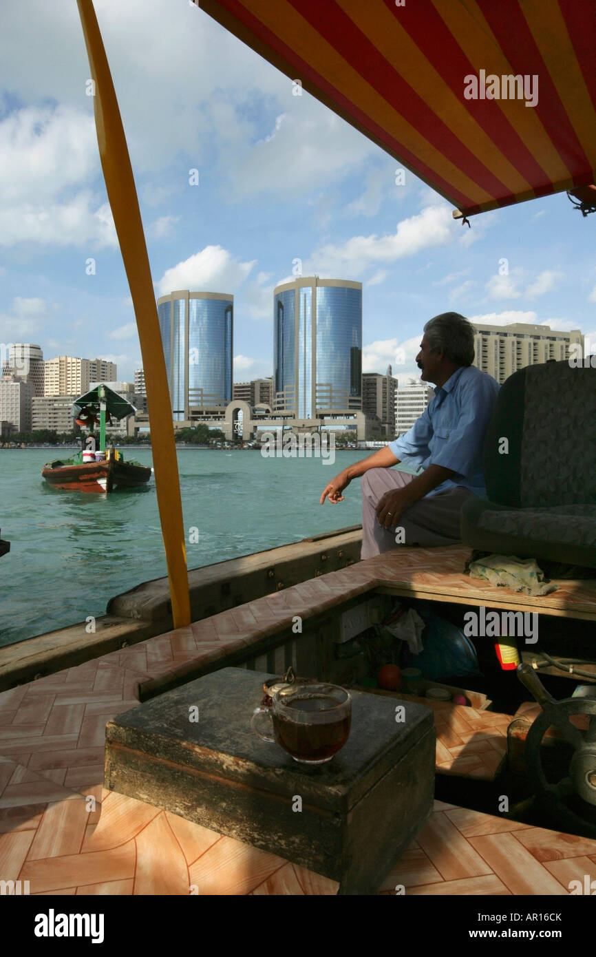 Man sitting on boat dubai hi-res stock photography and images - Alamy