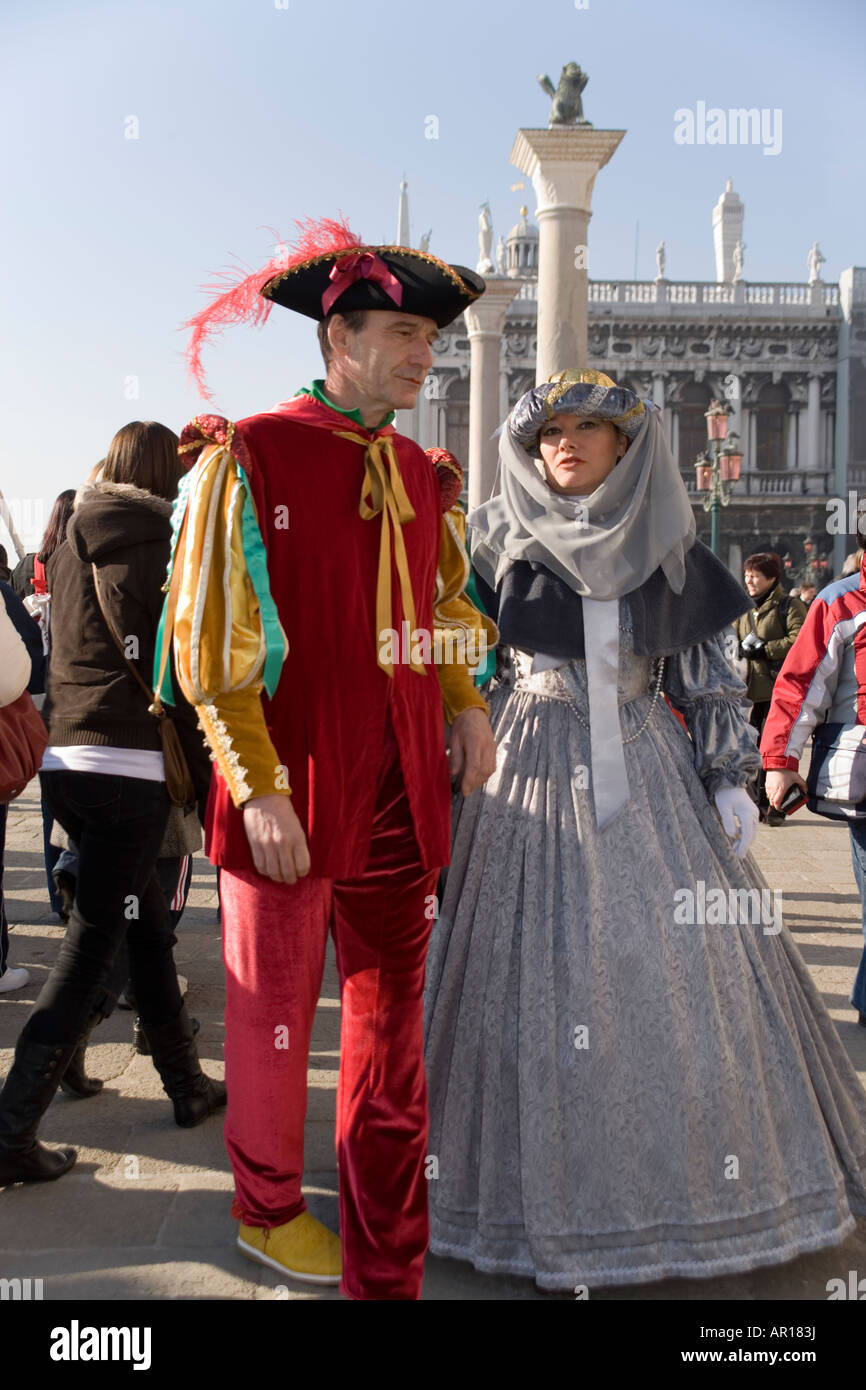 Revellers in costume at the Venice carnival, in St Mark's Square, Italy ...