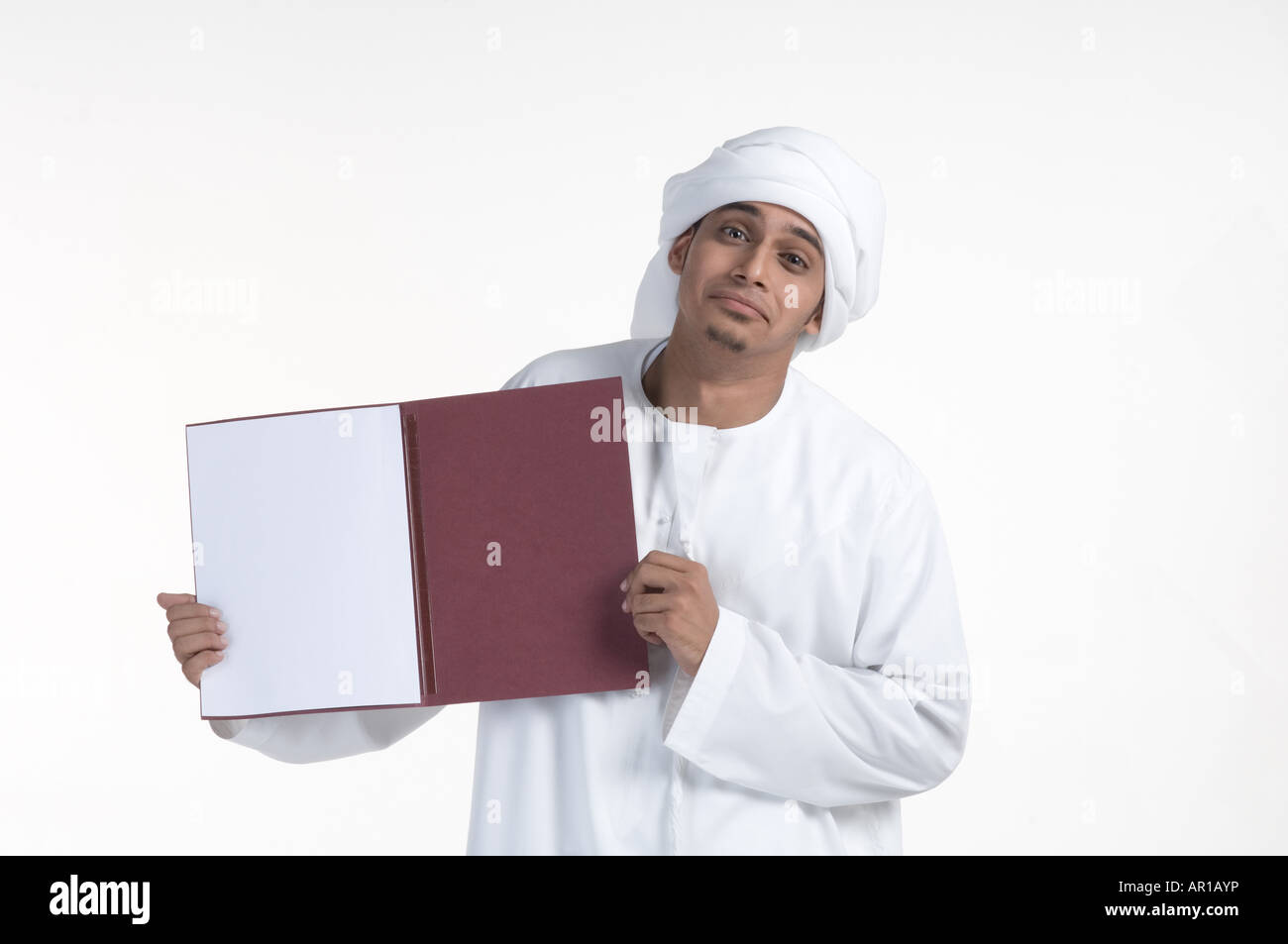 Young man holding file, portrait Stock Photo - Alamy