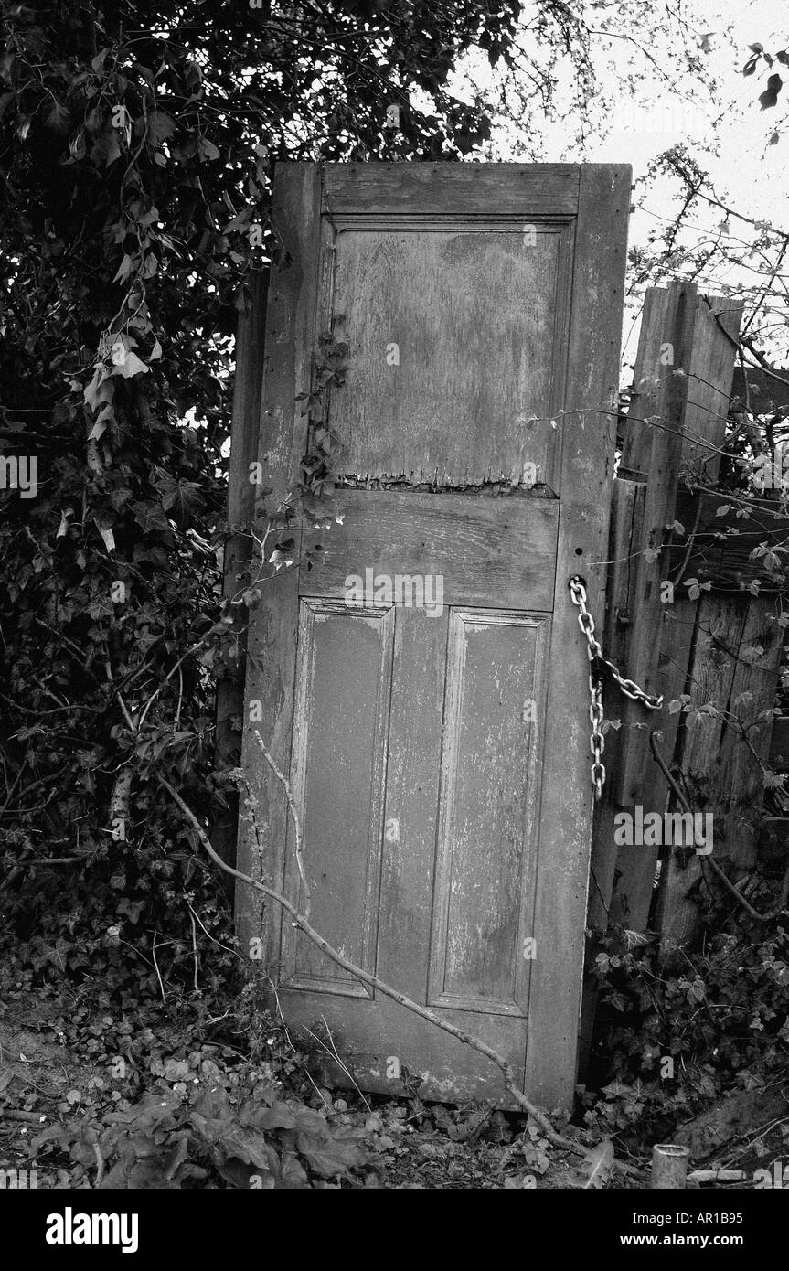 Battered wooden door Black and White Stock Photos & Images - Alamy