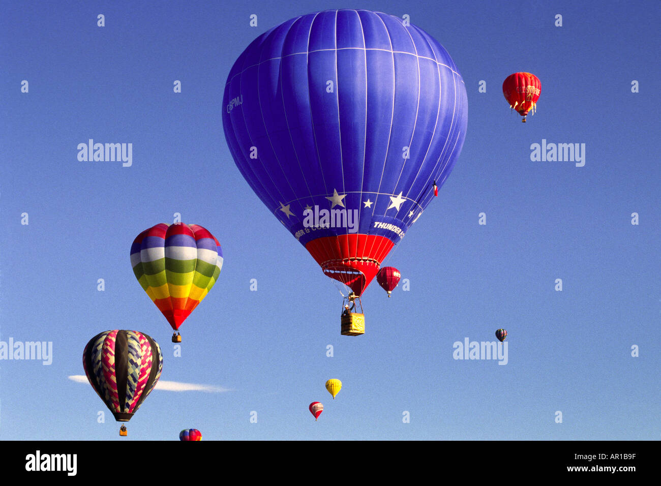 Blue sky filled with colorful balloons at Hot Air Balloon festival ...