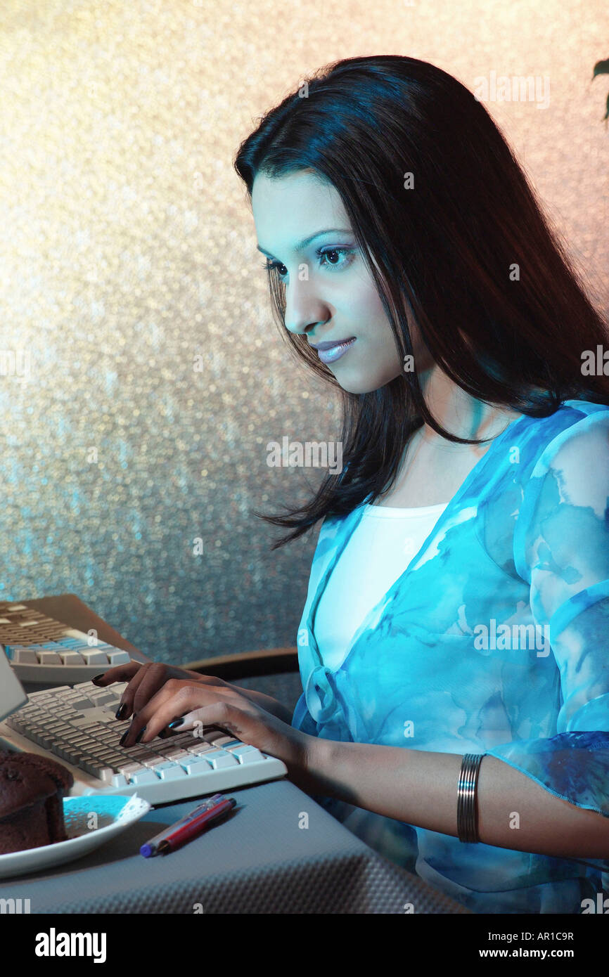 Lady on the computer Stock Photo - Alamy