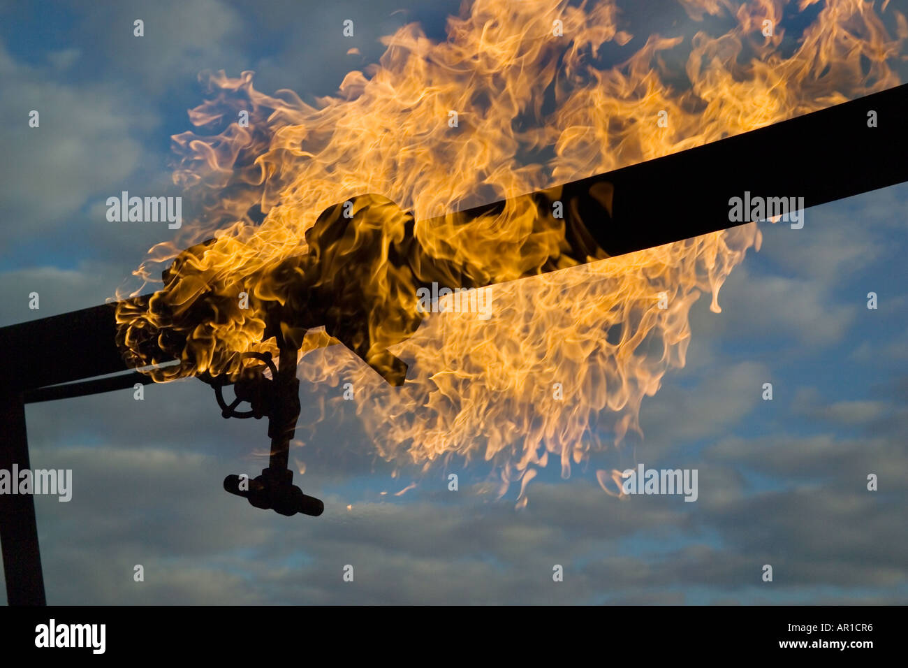 Industrial valve leaking flamable liquid on fire Stock Photo Alamy