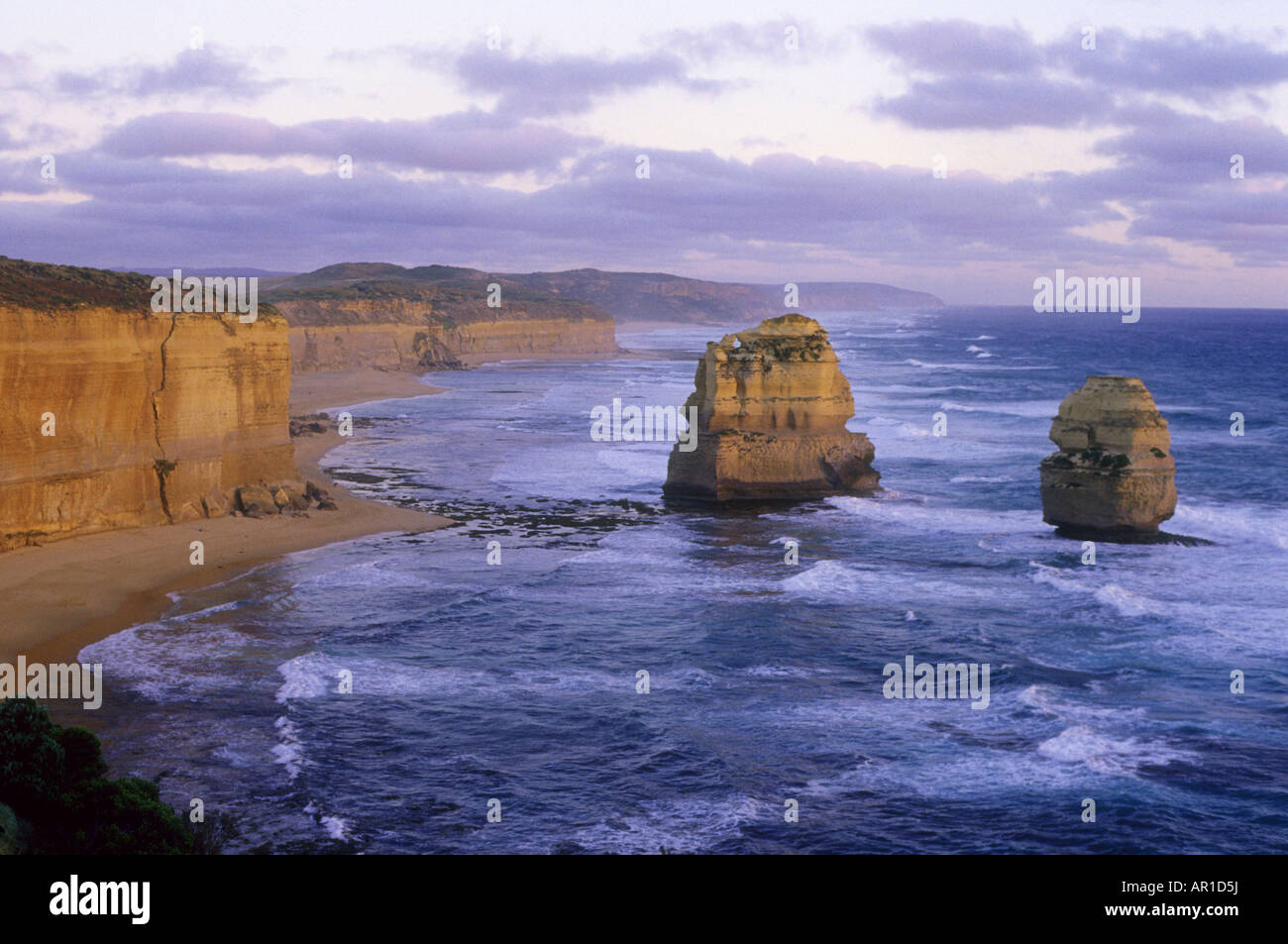 12 Rocks Look Out Two of the rocks known as the Twelve Apostles stands silhouetted ...