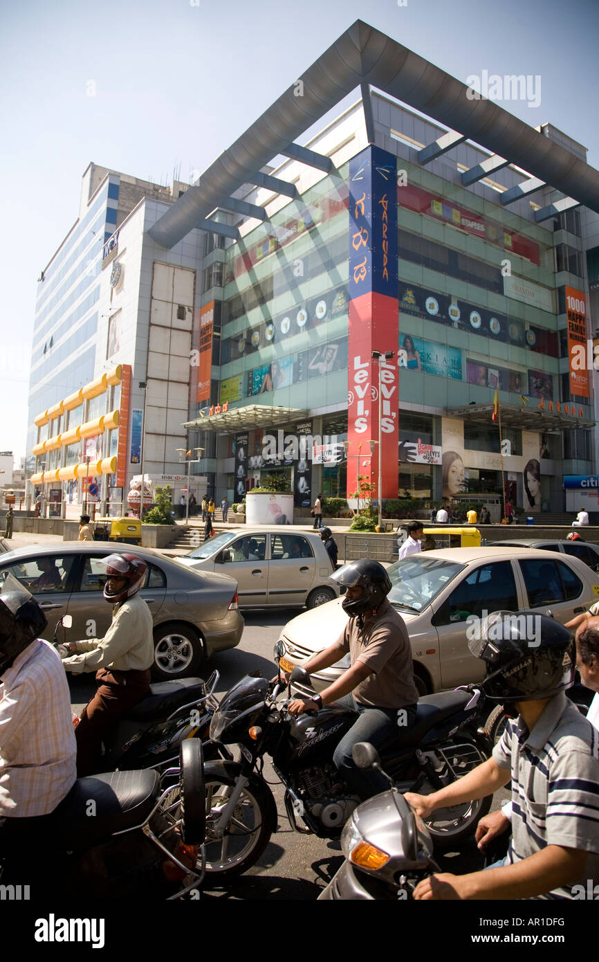 Traffic moves slowly past the Garuda Shopping Mall in Bangalore, South
