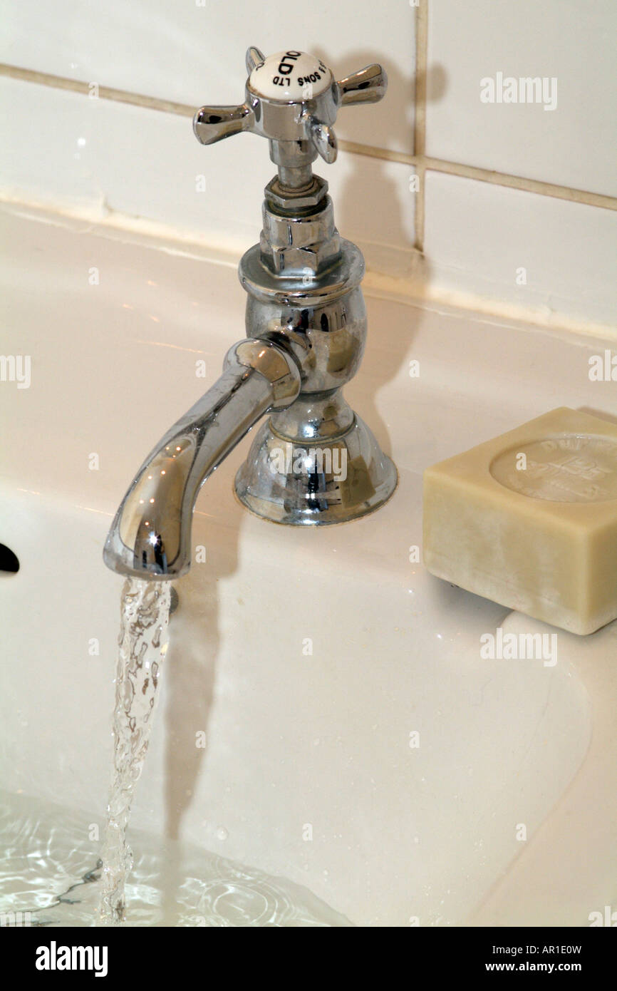 Cold Water Tap Soap and Running Water Stock Photo Alamy