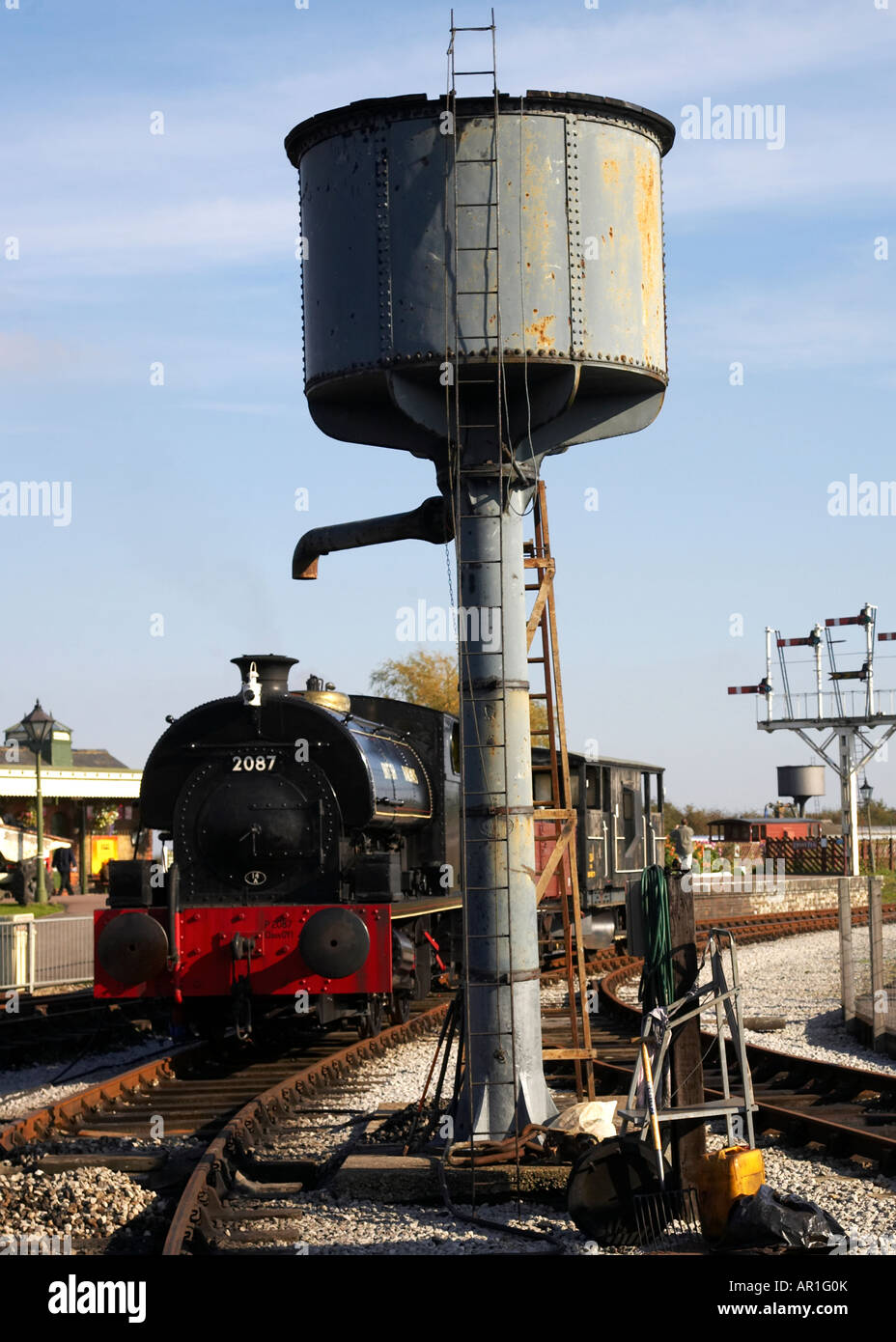 Steam train and water tower Stock Photo Alamy
