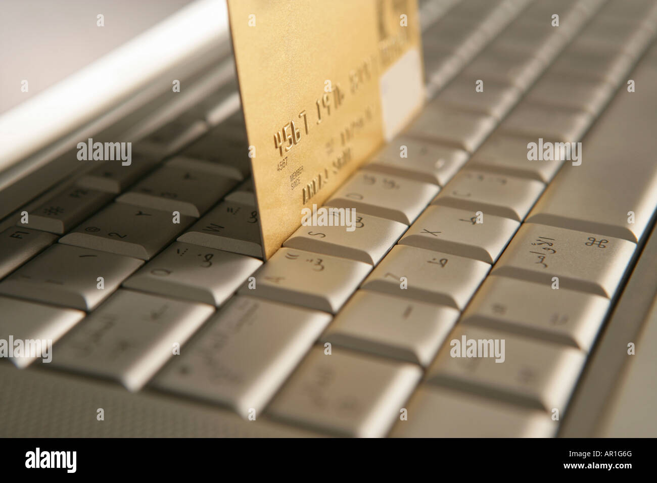 Credit card on a laptop Stock Photo Alamy