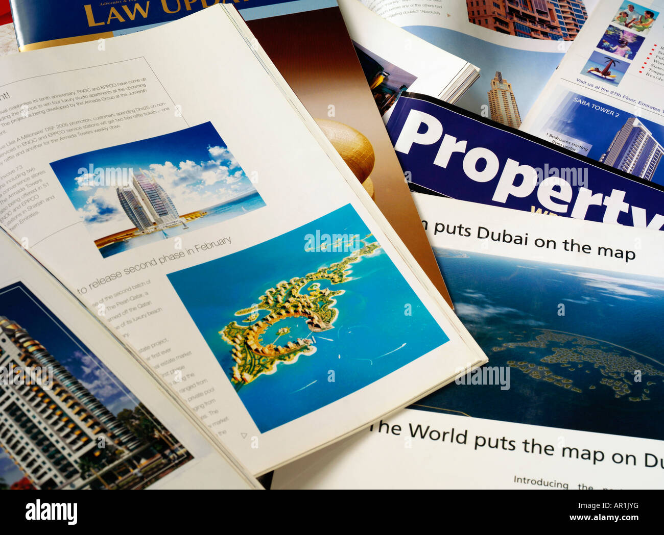 Print Media with new construction ads in Dubai Stock Photo