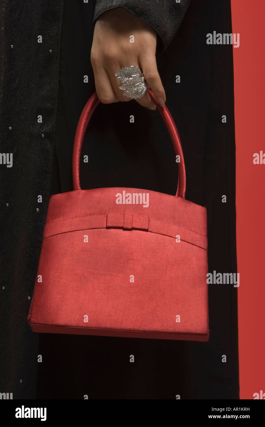 Hand holding bag hi-res stock photography and images - Alamy