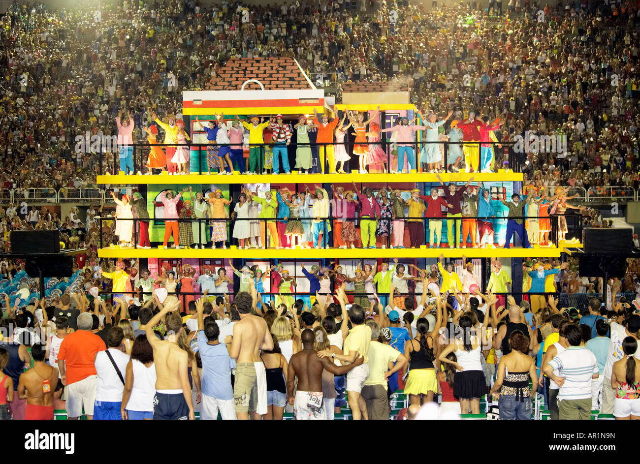 Carnival crowds watching carnival parade and floats in Smabadrome Rio