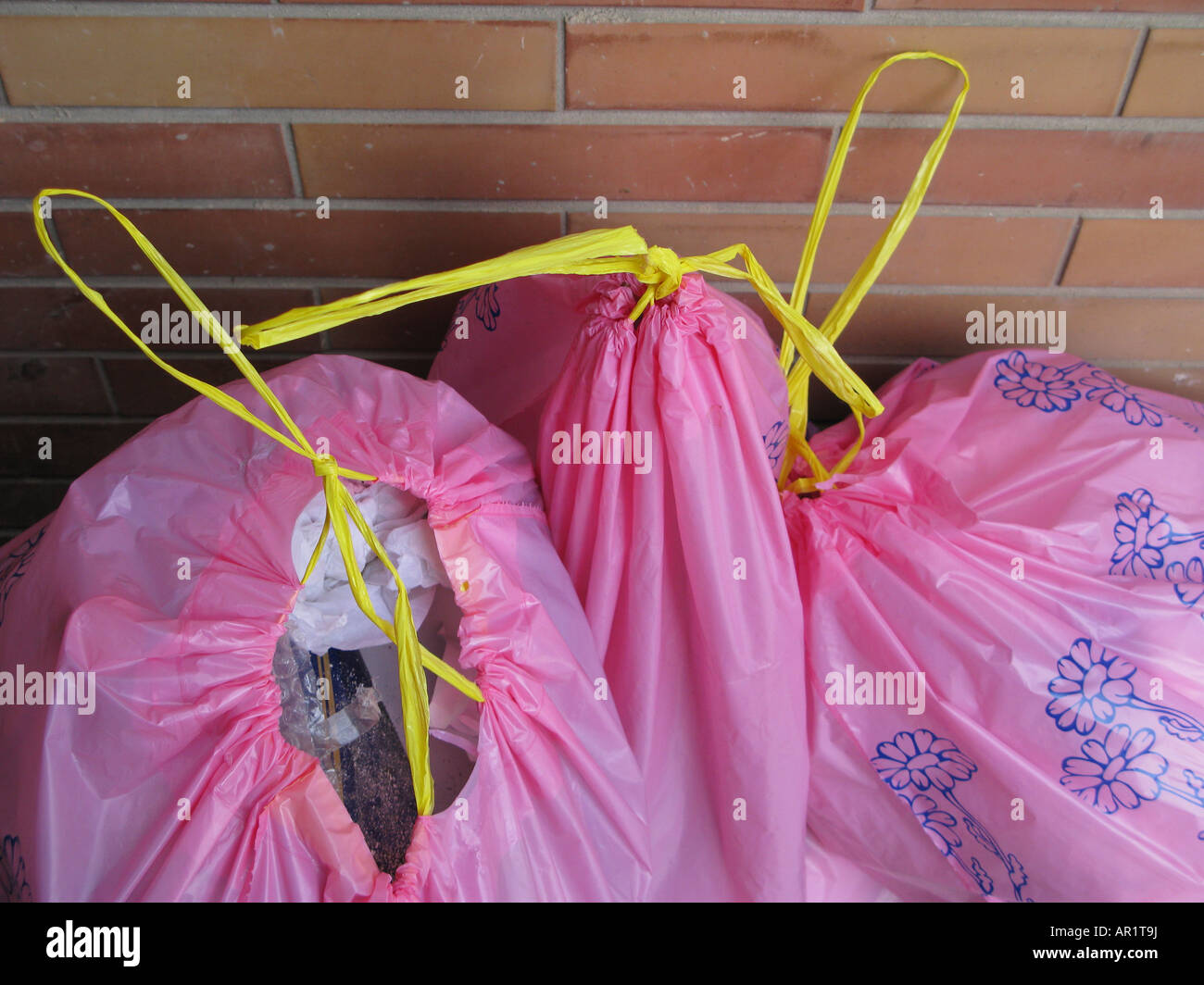 Pink Plastic Garbage Bags Stock Photo - Alamy