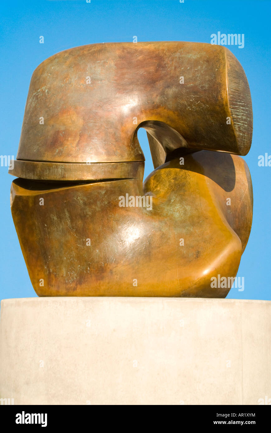Vertical close up of Henry Moore's Locking Piece bronze sculpture on a