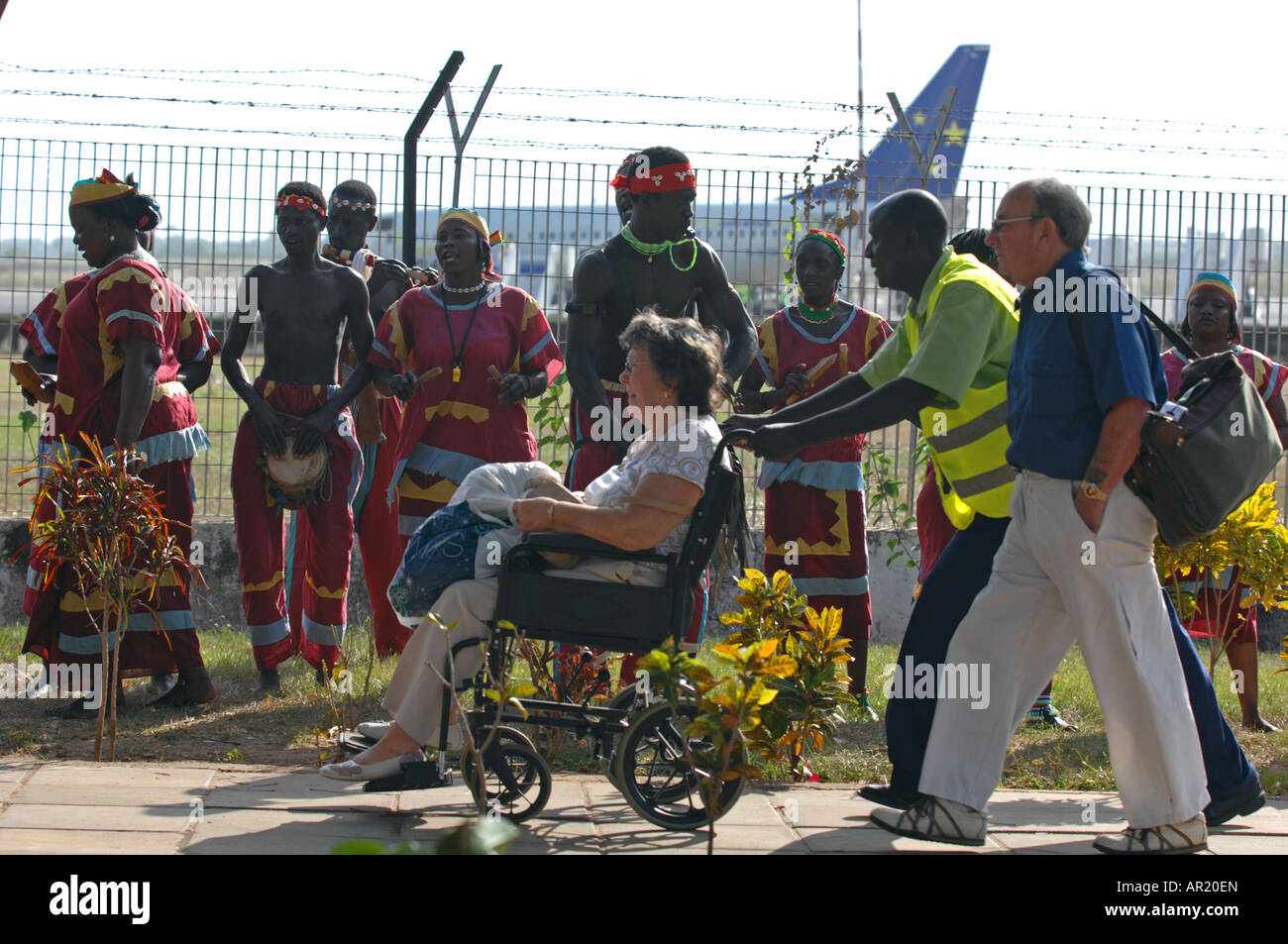 Traditional dancers welcoming tourists at Banjul International Airport, The Gambia, West Africa Stock Photo