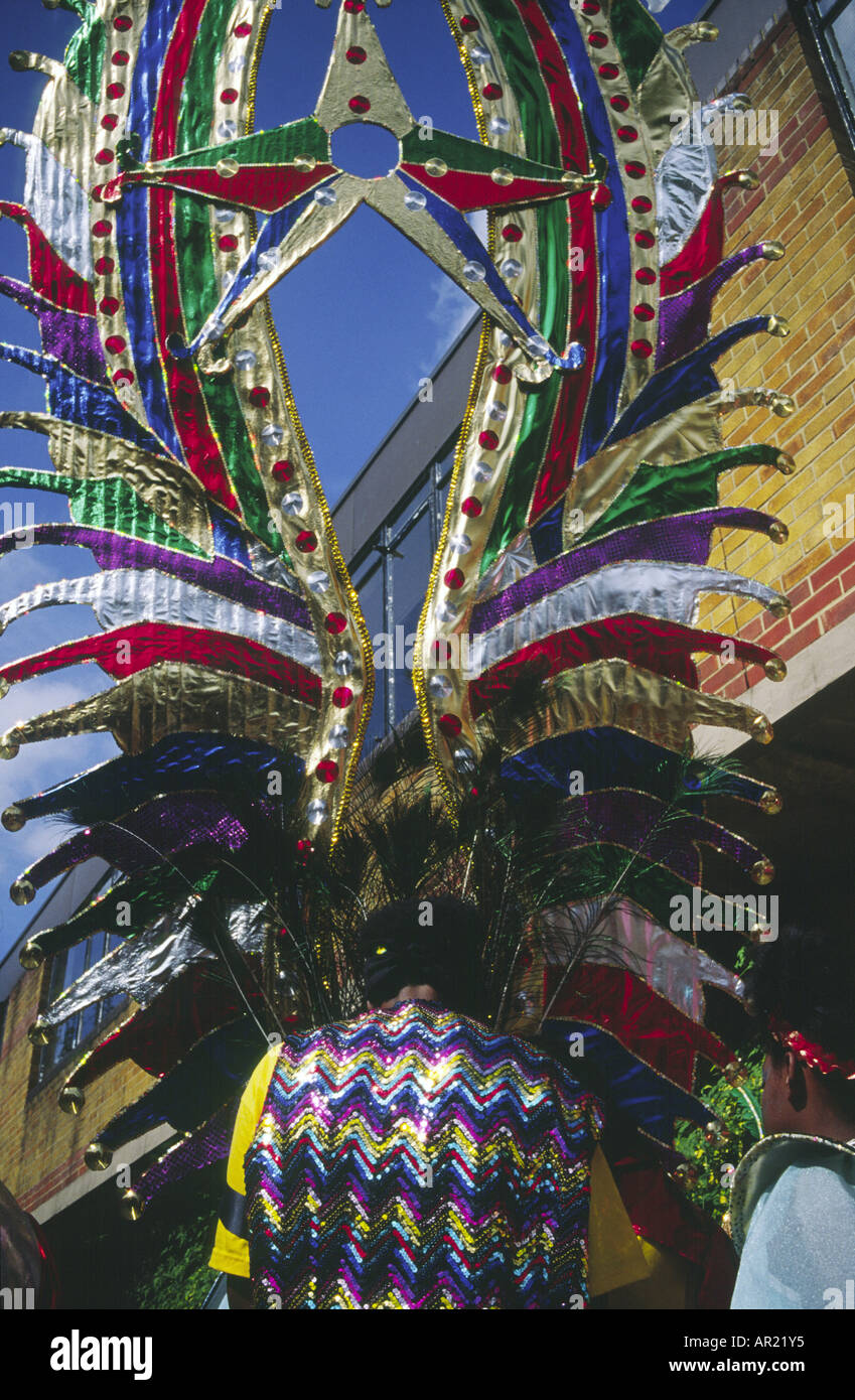 Street performers getting ready with bird costume at the Notting Hill Carnival, London UK Stock Photo