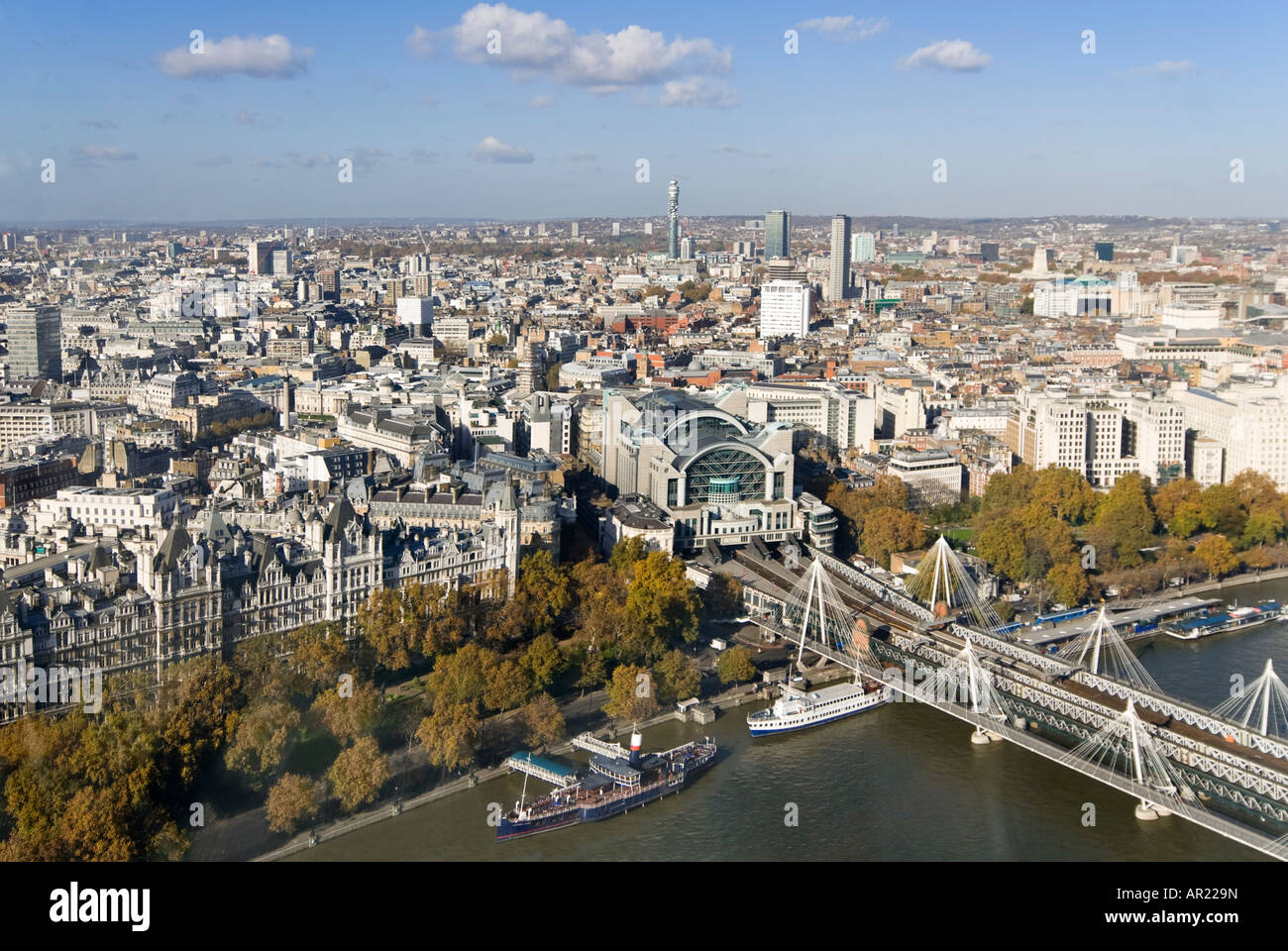 Horizontal wide angle aerial view across the rooftops of central and