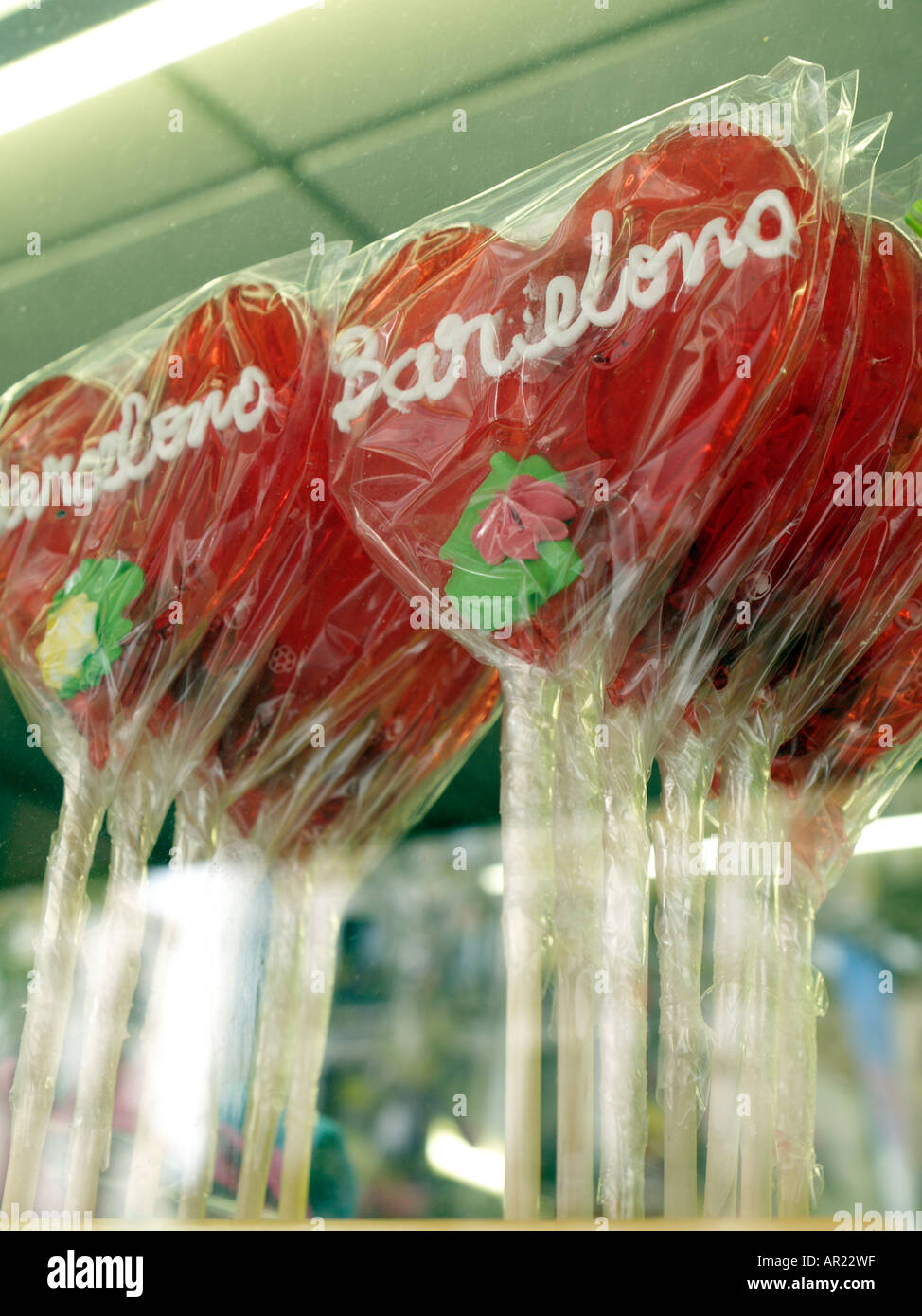 Heart shaped Lollipops with Barcelona written on it in sweet shop window Stock Photo