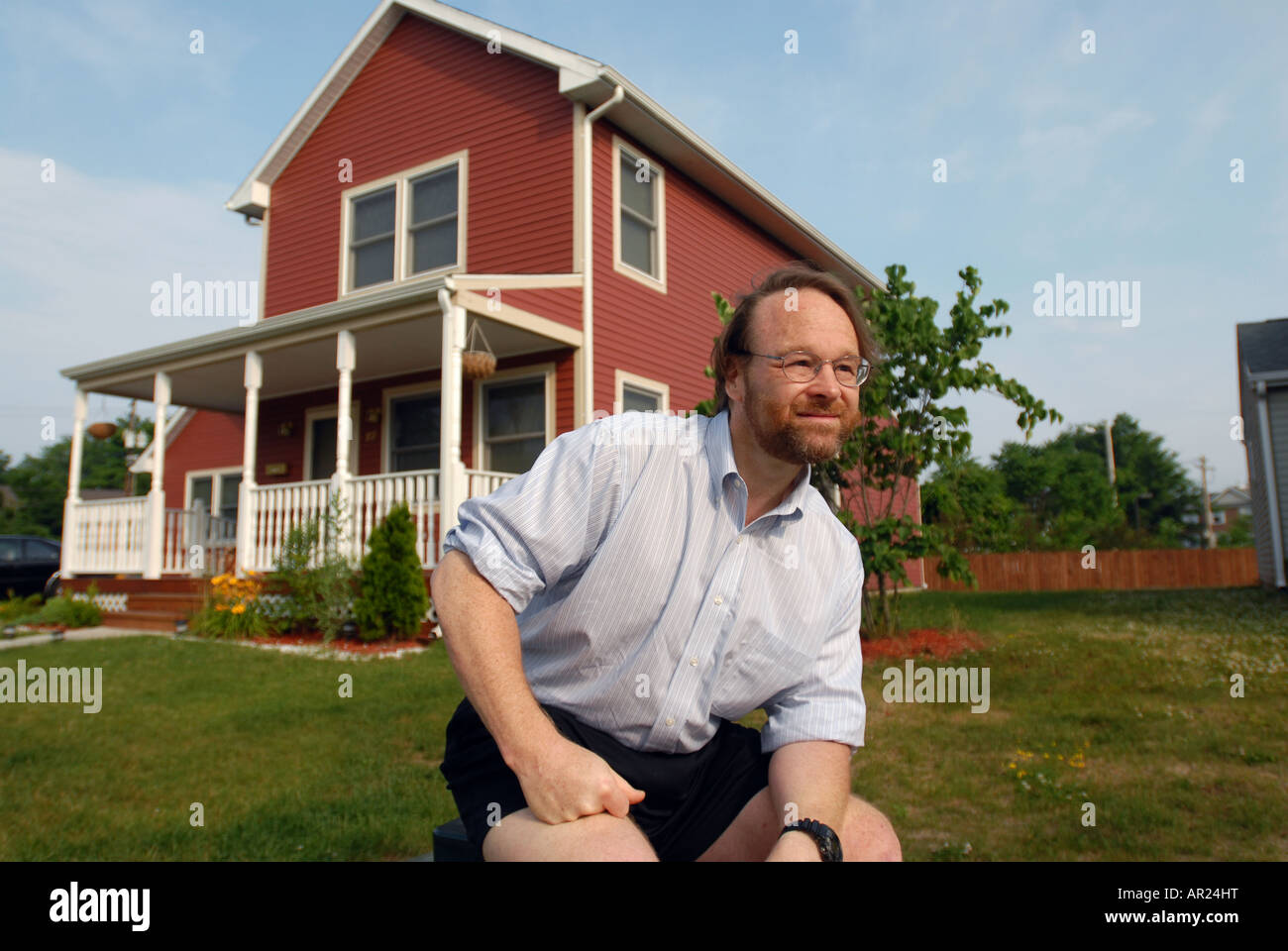 An Architect with a home he designed in a Low Income housing development in New Haven Connecticut USA Stock Photo