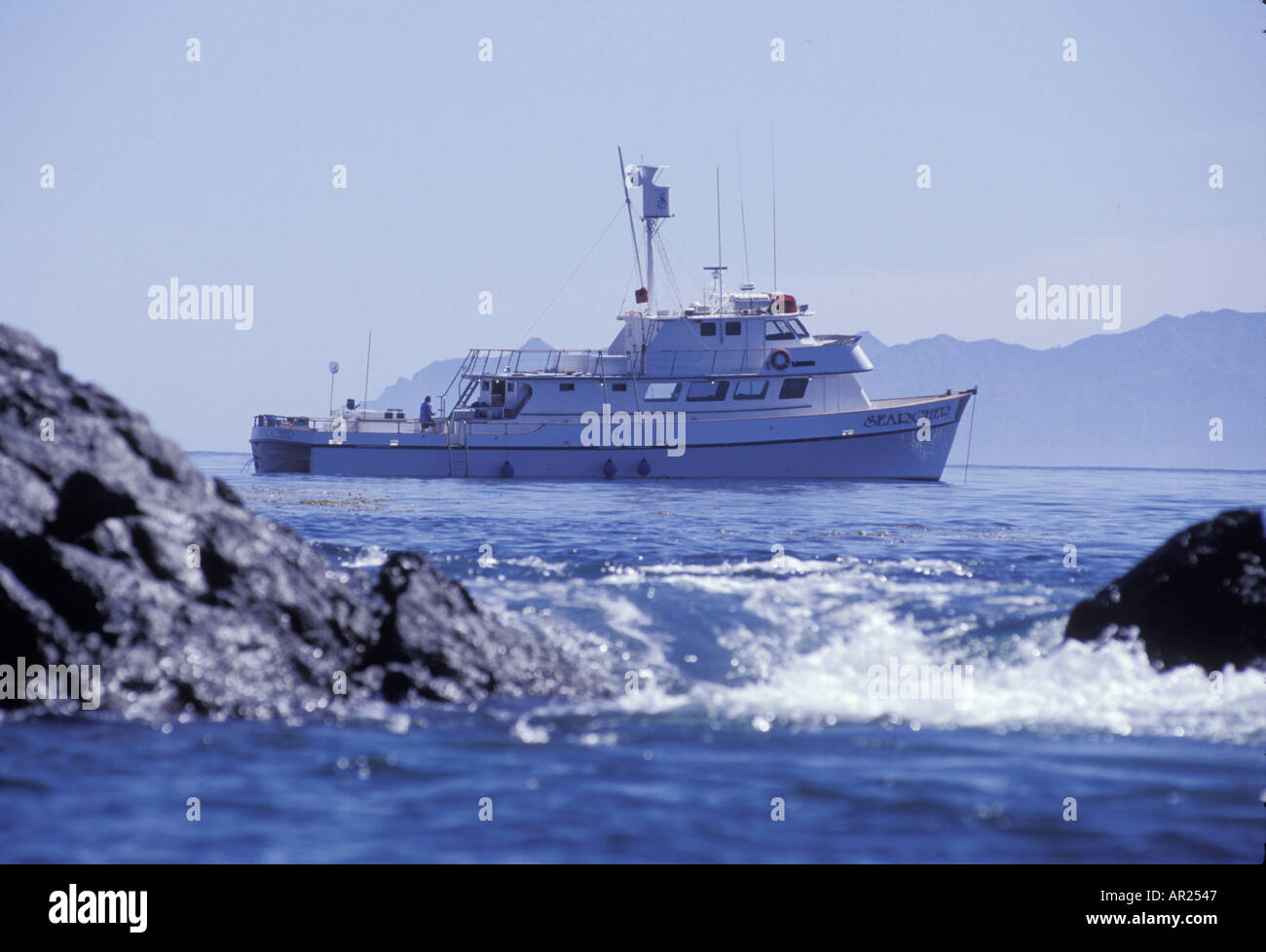Boat Guadalupe Islands Baja California Mexico mist low cloud fog weather condition ocean Kike